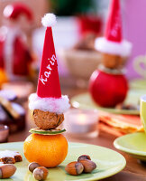 Walnut Father Christmas (6/6). Place card, Juglans (walnut), Corylus (hazelnuts), Citrus