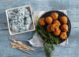 Vegetarian carrot balls with a spinach dip