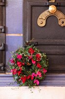 Wreath of Cyclamen, juniper twigs and Muehlenbeckia