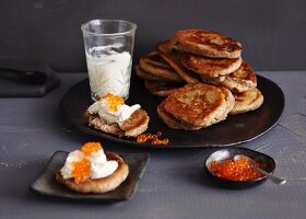 Blinis with cream cheese and salmon caviar (Russia)