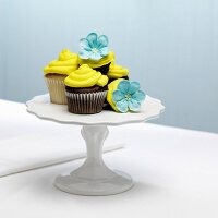 Chocolate and vanilla cupcakes with yellow icing