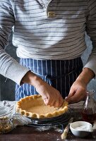 Preparing pastry cases for pies