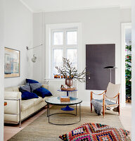 Designer furniture and wintry decorations in living room