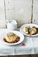 Yeast dumplings topped with poppyseeds and crumbled biscuit