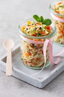 Mixed grain and vegetable salad in a glass