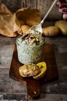 Oven roasted potatoes with mushroom cream in a glass