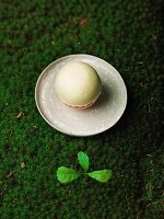 Raspberry and pistachio mousse with a liquid centre at the 'Auberge Frankenbourg' restaurant in La Vancelle, France, made by the chef Sébastien Buecher