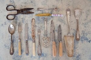 Various pieces of antique cutlery, cake servers and scissors