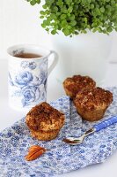 Healthy gluten-free muffins with pecan streusel topping