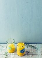 Apricot and rosemary drink with sparkling water