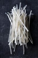 Dried glass noodles on a black background