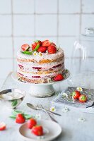 Strawberry cake with a carrot cake base and cream cheese