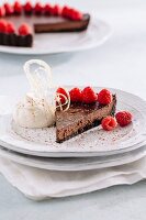 Chocolate tart with fresh raspberries and whipped cream