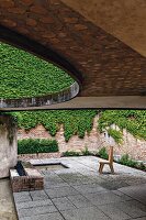 Sculpture garden with a round cutout roof on the Biennale grounds in Venice, Italy