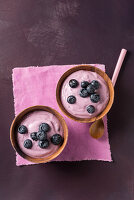 Blueberry cream in wooden bowls
