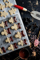 Christmas snowman biscuits on a wire rack