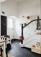 A terrace door and a staircase in a kitchen