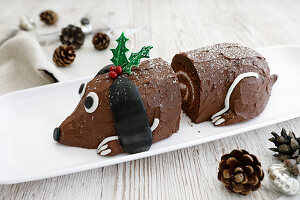 Yule Dog (Chocoalte swiss roll with vanilla cream filling and chocolate butter icing decoration with a twist)