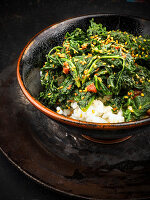 Kale with sesame seeds on a bed of rice (Korea)