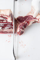 T-bone steak being cut