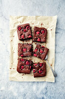 Chocolate brownie with raspberries made with rice flour