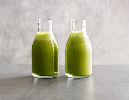 Exotic green smoothies made from spinach, pineapple and cashew nut mousse with coconut water