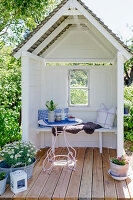 Shady seating area in summer arbour