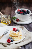 Japanese souffle pancakes with fruits and honey
