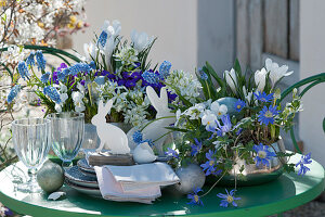 Blue and white Easter decorations on the terrace table