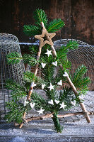 DIY Christmas tree made of branches and coniferous twigs
