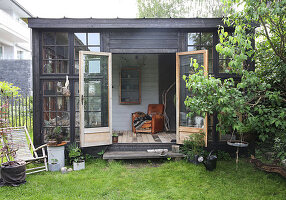 A view into a glass house made from recycled materials