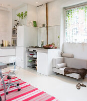 Dog sofa and dining area in the open kitchen in white