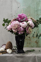 Bouquet of peonies and eucalyptus