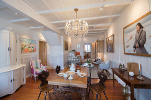 Set table in classic parlour with panelled walls