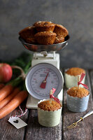 Carrot muffins with a pair of vintage scales
