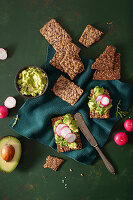 Keto crispbread with avocado cream and radishes