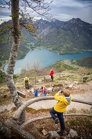 A hike with children with a view of Lake Ledro, Valle di Ledro, Trentino, Italy