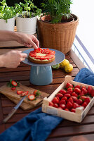 A strawberry tartlet being made