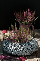 Budding heather in a wreath of white-colored branches