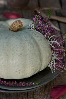 Pumpkin with budding heather