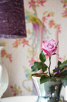 Rose in base and table lamp