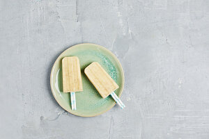 Homemade Banana Popsicle on White Background