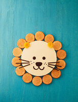 A lion cake (apricot cake with sandwich biscuits)