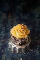 Cupcake topped with French buttercream