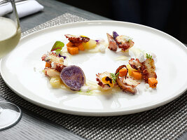 Grilled octopus with sauce and vegetables