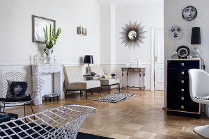 Elegant living room with designer furniture and parquet floor