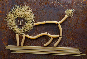 A lion made from raw pasta shapes