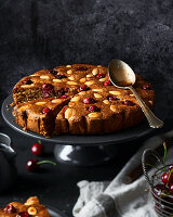 Almond and cherry cake with brandy and honey syrup