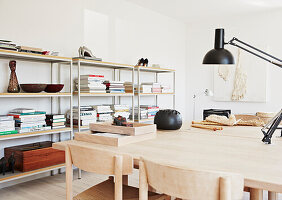 Light wooden desk and shelves in the study