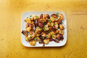 Indian tandoori cauliflower with red onions